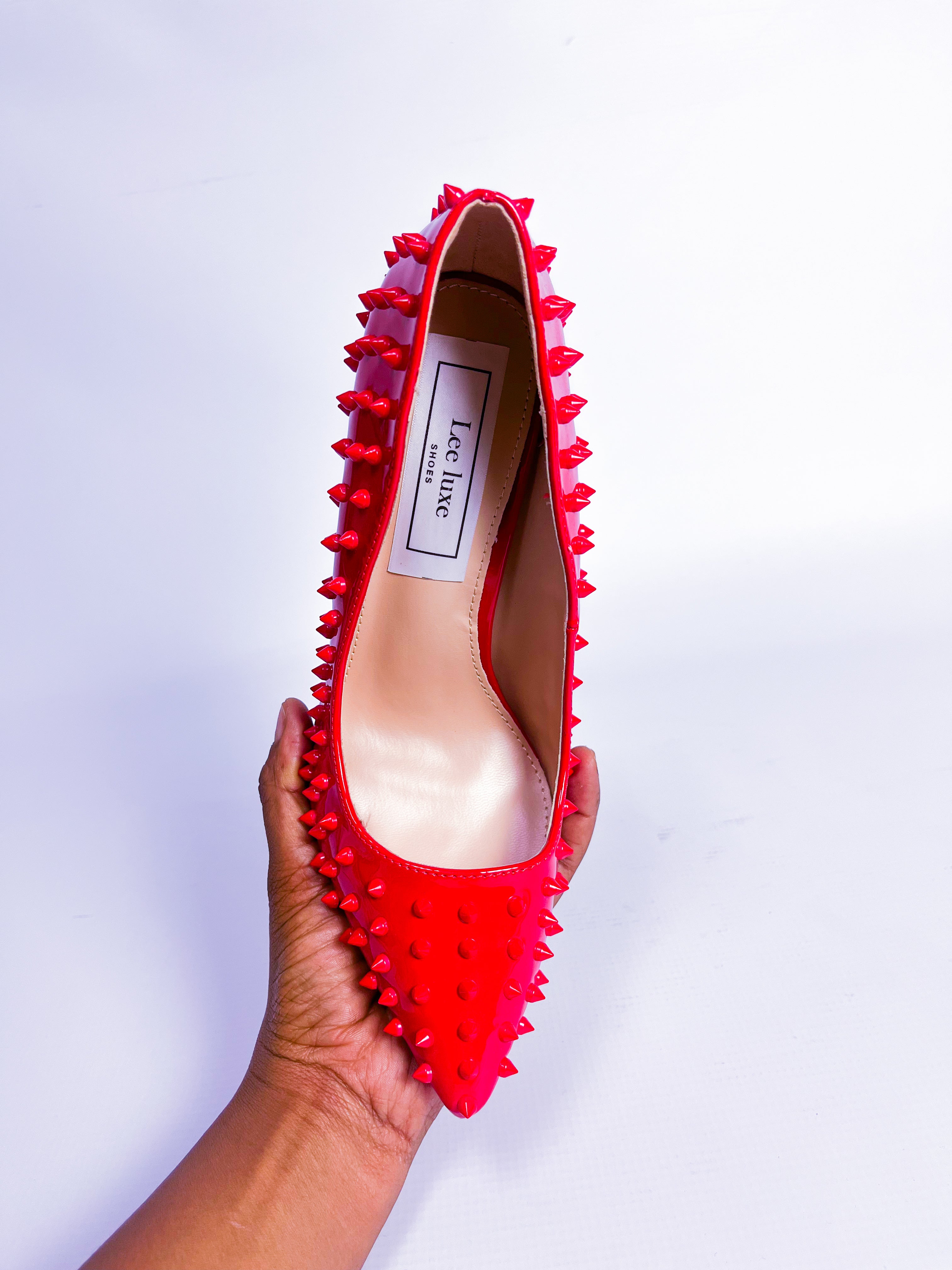 Red Spiked Patent Leather Stiletto Pump