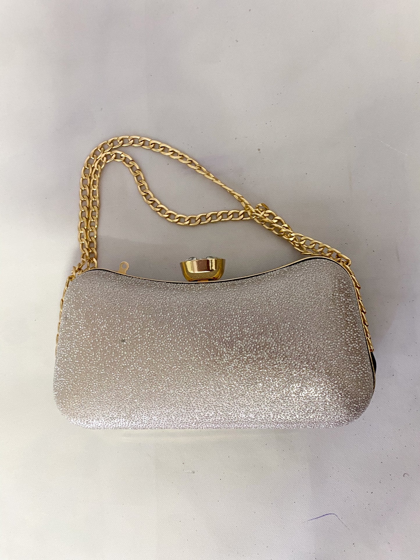 elevated golden handbag